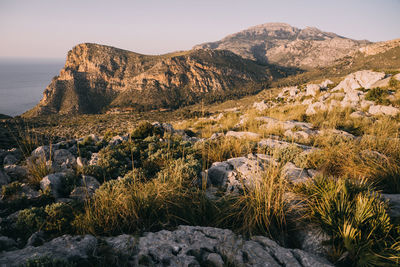 Scenic view of rocky mountains against sky