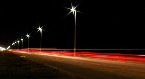 Light trails on road at night