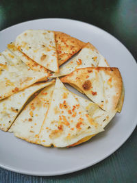 Close-up of bread in plate on table