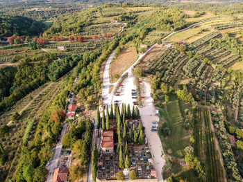 High angle view of road amidst trees in city