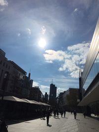 Sun shining over city