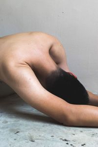 Close-up of person feeding on sand
