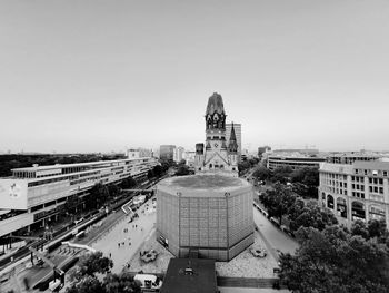 High angle view of buildings in city against clear sky