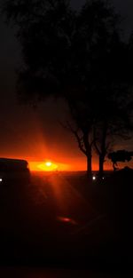 Scenic view of silhouette trees against sky during sunset