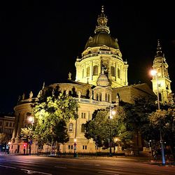 Low angle view of illuminated building at night