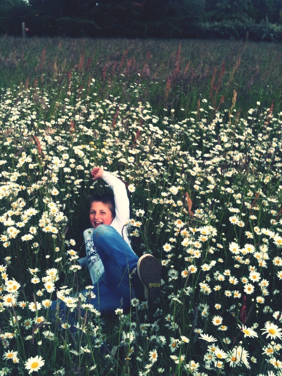 person, lifestyles, casual clothing, leisure activity, elementary age, childhood, flower, smiling, looking at camera, plant, girls, portrait, growth, standing, field, innocence, waist up, nature