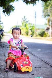 Portrait of cute girl with toy