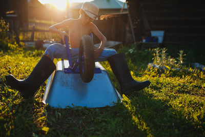 Man sitting on field