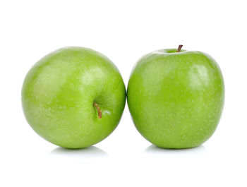 Close-up of apple against white background