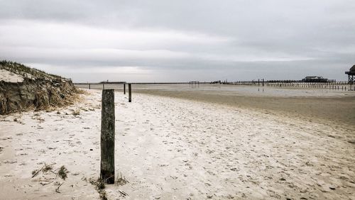 Scenic view of beach against sky