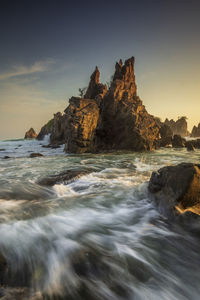 Scenic view of sea against sky during sunset