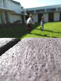 Close-up of man against built structure