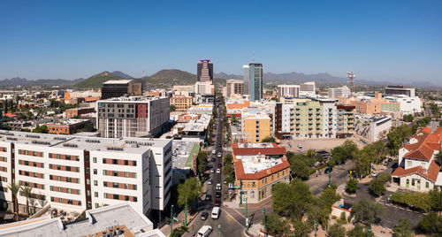 Panorama of condos and businesses in downtown tucson, arizona, aerial. traffic on congress street.