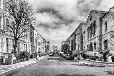 Walking among the picturesque buildings in lancaster road, notting hill district, london, uk