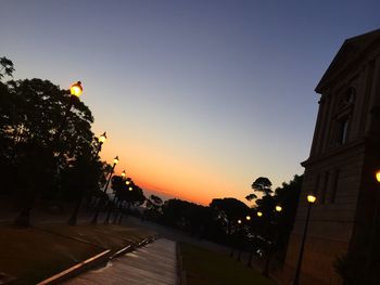 Silhouette buildings against clear sky