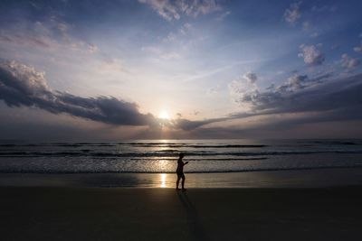 Scenic view of sea at sunset