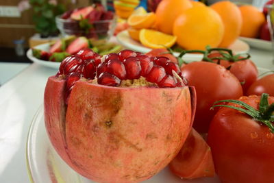 Close-up of fruits in plate on table