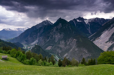 Scenic view of snowcapped mountains against sky