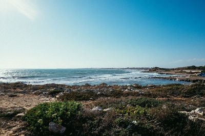 Scenic view of sea against clear sky