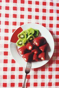 Directly above shot of strawberries in plate on table