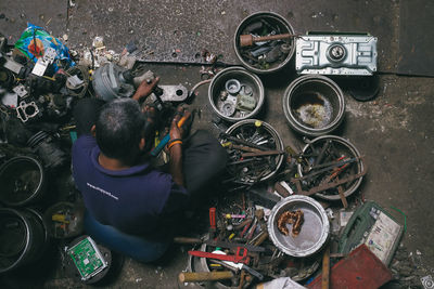 High angle view of man wearing shoes