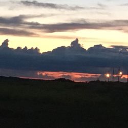 Scenic view of landscape against sky during sunset