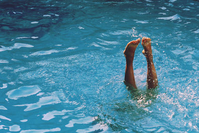 High angle view of person swimming in sea