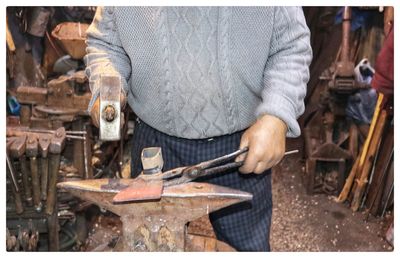 Man working on wood