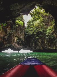 Scenic view of sea against rock formation