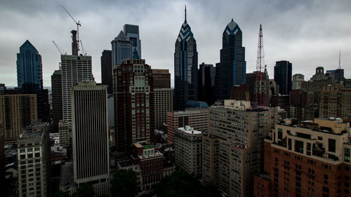 Modern buildings in city against sky