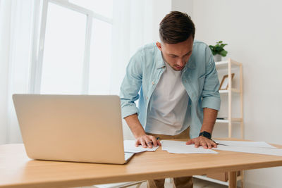 Businesswoman working at desk in office