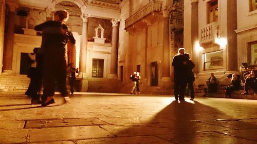 Woman standing in city