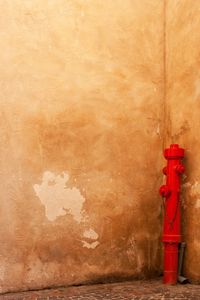 Fire hydrant against wall