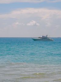 View of sailboat in sea against sky