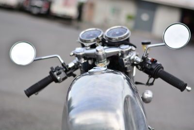 Close-up of bicycle parked on street