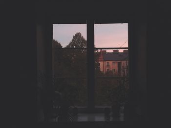 Buildings seen through window at home