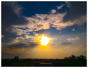 Low angle view of cloudy sky during sunset