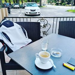 High angle view of coffee served on table at cafe