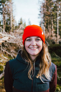 Portrait of a smiling young woman in winter