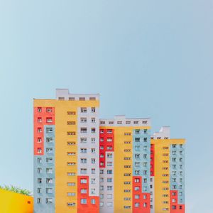 Low angle view of buildings against clear sky