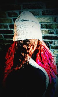 Rear view of woman wearing hat