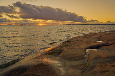 Scenic view of sea against sky during sunset