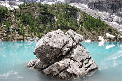 Rock formation in mountain lake