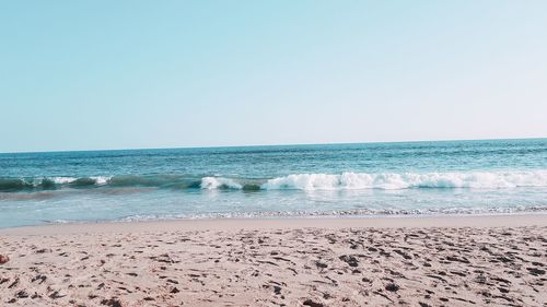 Scenic view of sea against clear sky