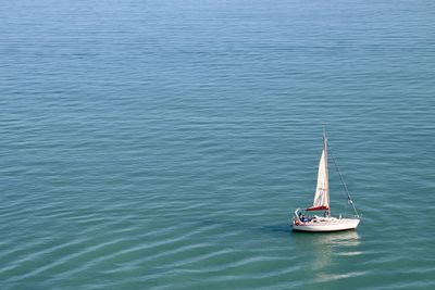High angle view of sailboat sailing in sea