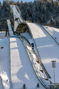 High angle view of winter sports on snow covered landscape