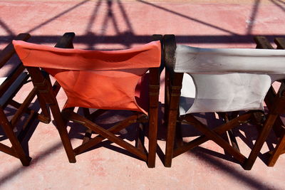 Empty chairs and tables in restaurant