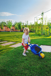 Boy playing on land