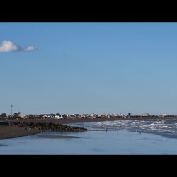 Scenic view of beach against clear sky