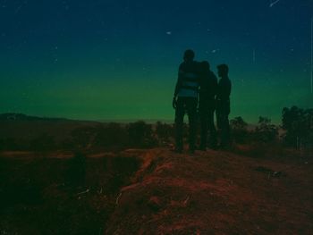 Scenic view of landscape against sky at night